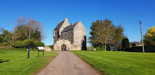 The road leads to the archway of Midhope Castle which features as Lallybroch in the TV series