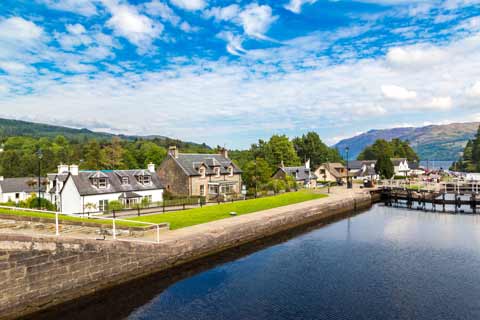 Cottages sitting by the banks of the Caledonian Canal in Fort Augustus