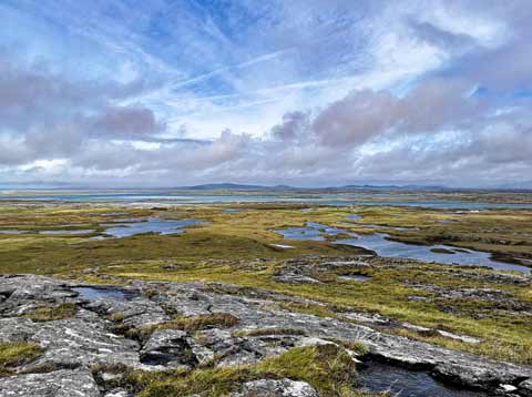 Lochans and moorland stretch into the distance on the Isle of Benbecula