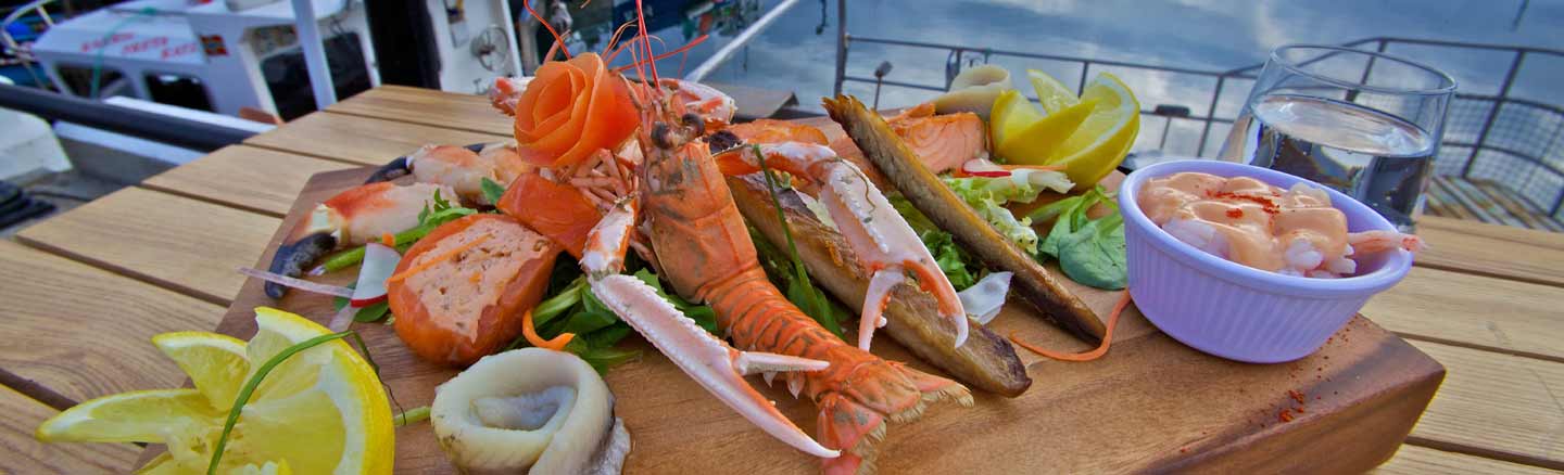 A selection of seafood posed by the harbour at Kirkwall Orkney