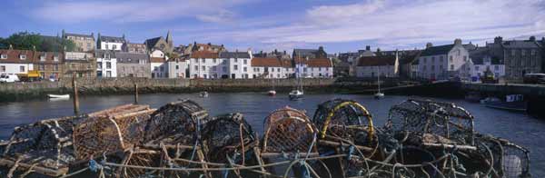 Lobster pots stacked by the harbour at St Monans