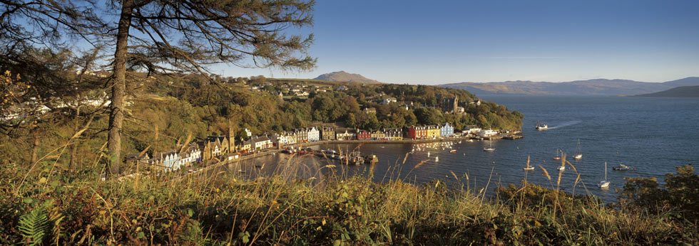 Looking out over the Sound of Mull with the colourful buildings that surround Tobermory Bay seen below