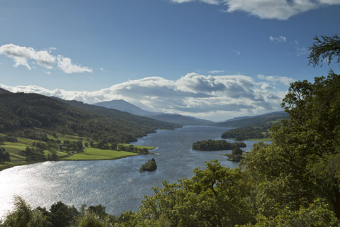 Queens View - wide river Tummel with forest on either side and a view to Schiehallion in the background