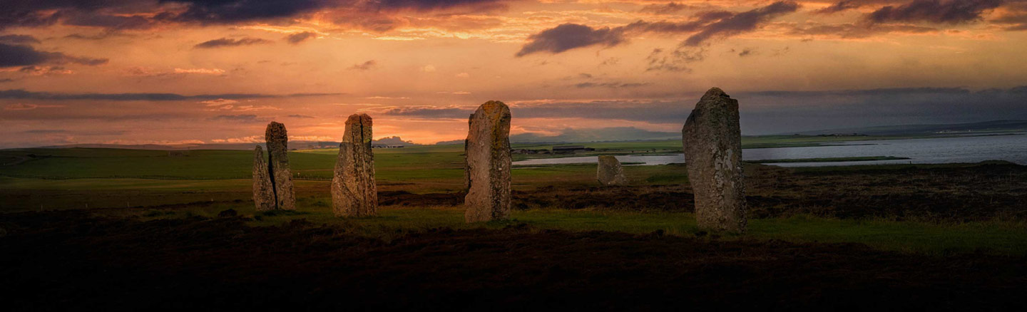 Five standing stones of the Ring of Brodgar at sunset