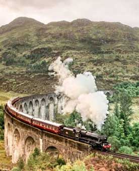 Jacobite Steam Train crossing the Glenfinnan Viaduct
