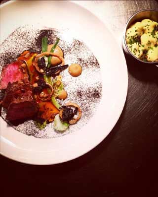 Flat iron steak, Onions & Black Trumpet Mushrooms served at Scorrybreac Restaurant-