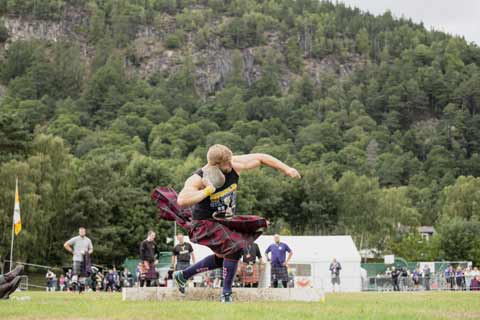 Kilted athelete competing in the Shot Put competition