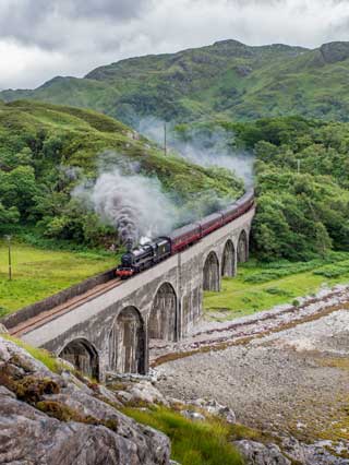 The Jacobite crossing the Loch nan Uamh viaduct