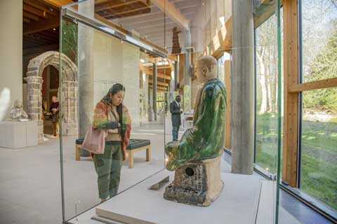 A visitor touring the galleries of the Burrell Collection