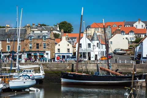 The Reaper, a preserved herring drifetr and pleasure boats in Anstruther Harbour