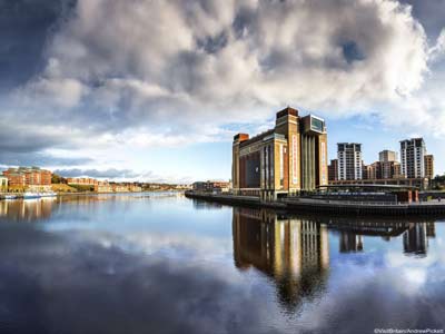 The Baltic Centre for Contemporary Art is reflected in the still water of the River Tyne