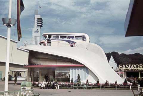 SMT Pavilion at the Empire Exhibition with a touring coach on the roof