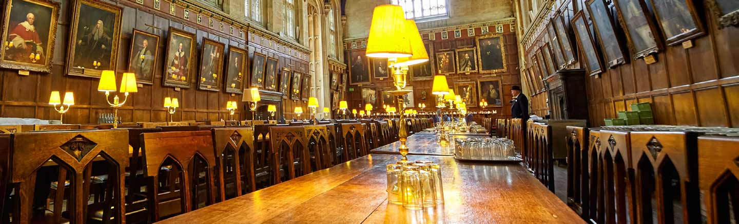 Portraits hang on the wood panelled walls of Christ Church Hall, Oxford