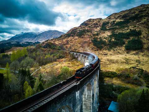 Jacobite Steam Train crossing Glenfinnan Viaduct