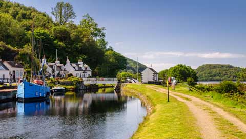 Tranquil view of boats moored on the Crinan Canal