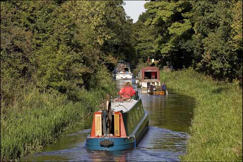 Canal boats navigate the Union Canal