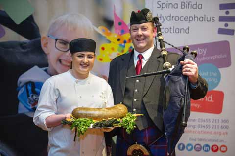 Chef and Piper present the haggis