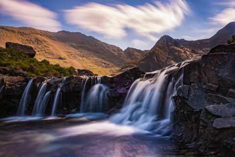 Crystal clear water cascade into the Fairy pools