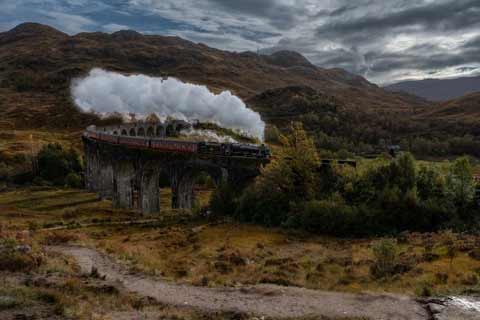 Jacobite Steam Train crossing the Glenfinnan Viaduct