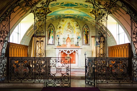 The ornate interior of the Italian Chapel