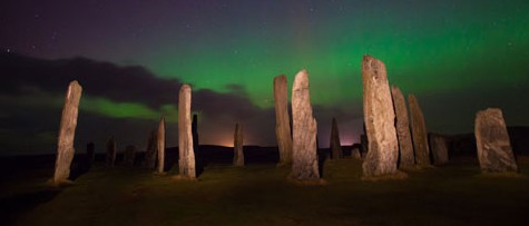 The Northern Lights seen at Callanish Standing Stones, Isle of Lewis