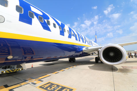 passengers boarding a Ryanair plane