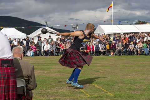 Athelete competing at a Highland Games