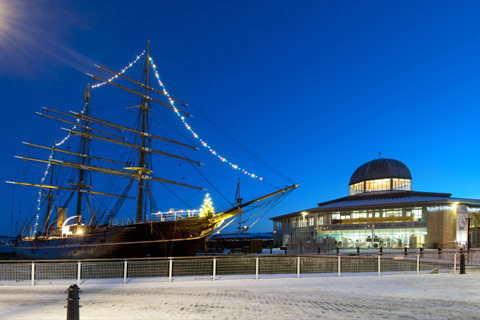 Dundee Waterfront in evening showing the V&A museum and the RRS Discovery ship